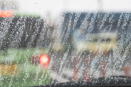 Rain on the windshield of a carの写真素材