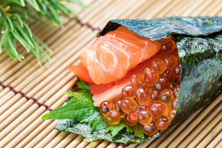 Salmon hand-rolled sushiの写真素材