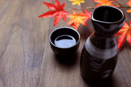 Sake and Autumn Leavesの写真素材