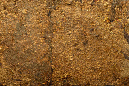 Fake gold yellow texture abstract wall background and gradients shadow shiny