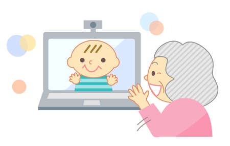 Elderly people talking online with their grandchildren with a smileのイラスト素材