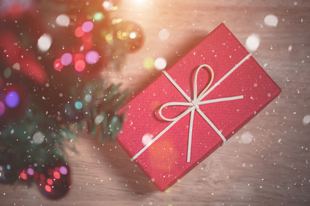 Christmas and New Year's Day, Top view red gift box decorated with ribbon and decoration christmas tree.の写真素材