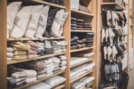 Light colored towels are lined up on the store shelves in department stores, Shopping.の写真素材