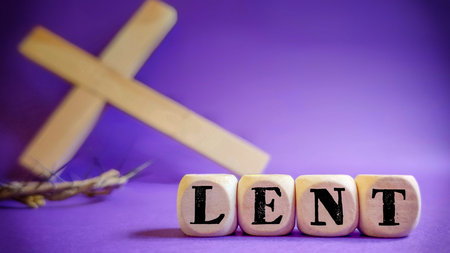 Lent Season,Holy Week and Good Friday concepts - word lent on wooden blocks in purple vintage...
