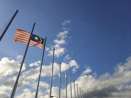 March 15, 2020 - Sabah, Malaysia : Flag of Malaysia flown on flagpole backgroundのeditorial素材