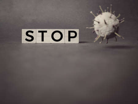 Stop text in vintage background. Coronavirus pandemic concept.の写真素材