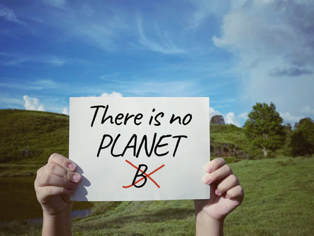 There is no place to plan card in hands with nature background.