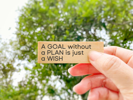 Inspirational Quote - a goal without a plan is just a wish text with blurry nature background. Stock photo.の写真素材