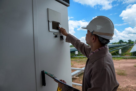 Electrical engineer working at control room of a modern  plant