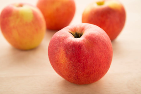 red apples on wooden background