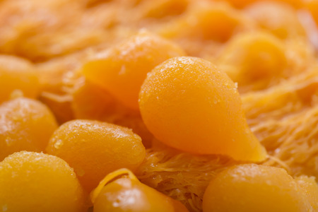 egg yoke fudge balls cooked in syrup,Thai Dessert.(Tong-yod)の写真素材