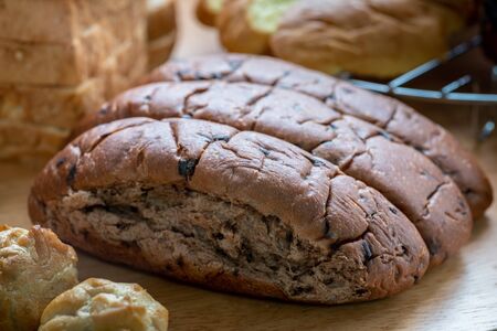 Close up of many kind of bakery on wooden backgroundの写真素材