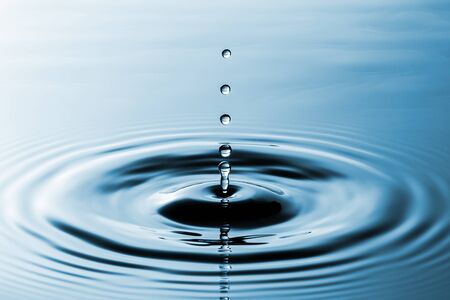 Clean water drops evoke pure nature.の写真素材