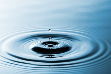 Clean water drops evoke pure nature.の写真素材