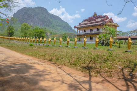 Monk In the line Statue in myanmar country side,Monk statue myanmarの写真素材