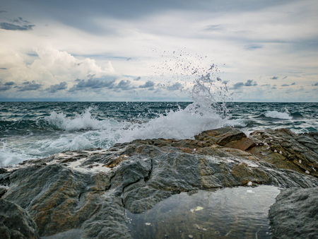 Ocean wave crashing Onto Rocky in the Blue ocean,Khao Laem Ya nation park Thailand,Seascape conceptの写真素材