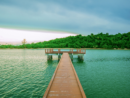 Wooden bridges on the ocean with idyllic ocean and beautiful Sky in vacation time,Holiday in the sea,Summer conceptの写真素材