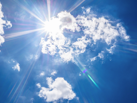Amazing Idyllic Blue sky background and sun ray with white cloud,cloudscape conceptの写真素材