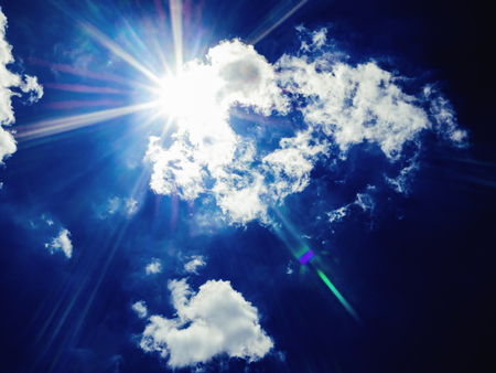 Amazing Idyllic Blue sky background and sun ray with white cloud,cloudscape conceptの写真素材