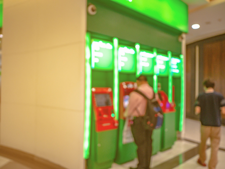 Abstract blurred photo of the Green bank in department storeの写真素材