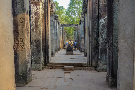 :Inside Bayon Temple siem reap and tourist visit angkor wat,siem reap cambodia,wonder of the worldの写真素材