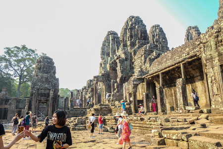 Siemreap/Cambodia - February 03 2016:Bayon Temple siem reap with blue sky and tourist visit angkor wat,siem reap cambodia,wonder of the worldのeditorial素材