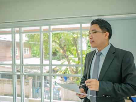 Very Happy asian business man in the office,business conceptの写真素材