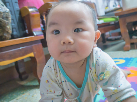 Cutie handsome asian babyの写真素材