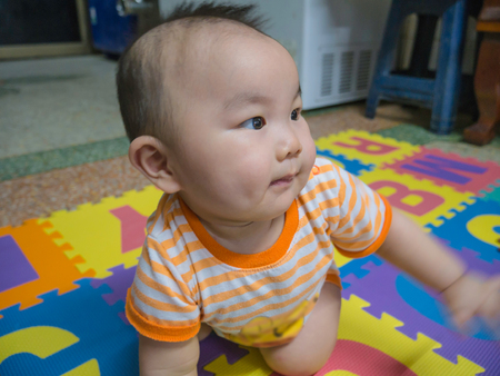 Cutie handsome asian Boy baby,Close up infantの写真素材
