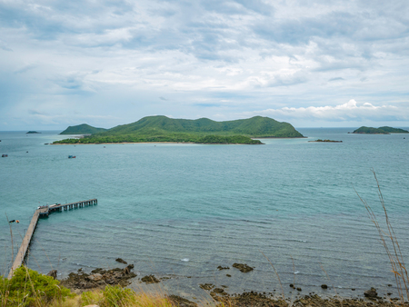 Viewpoint of Khao Ma Jor Pier with Idyllic ocean Samae San Island and rainy cloud sky,Chonburi thailand,holiday conceptの写真素材