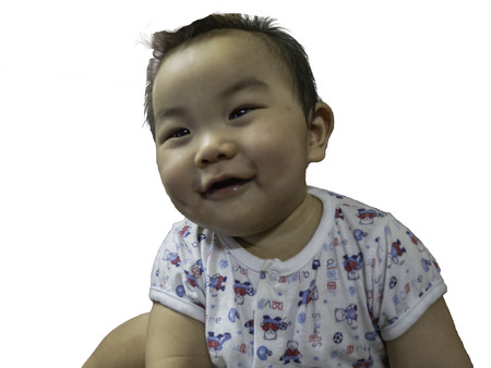 Cutie handsome asian Boy baby smile very happy on isolated backgroundの写真素材