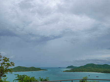 Tropical Idyllic ocean with beautiful Rain cloud sky and endless horizon view from Viewpoint on Khao Ma Jor Pier Chonburi thailand in vacation time,holiday conceptの写真素材