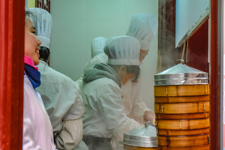 Shanghai/China -  January 27 2015:Unidentified Chinese Chef Cook and trade traditional food at Yuyuan Garden in Old City area in Shanghai Chinaのeditorial素材