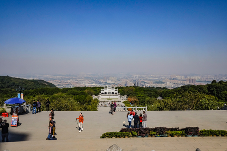 Foshan/China-27 November 2015:View on top in xiqiao mountain park with foshan cityscape in Chinaのeditorial素材