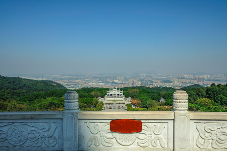 View on top in xiqiao mountain park with foshan cityscape in Chinaの写真素材