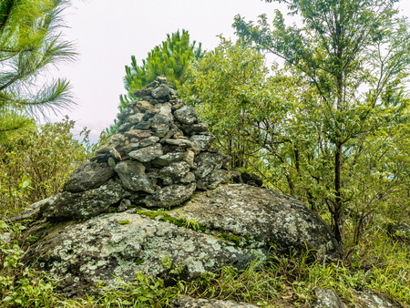Stone tower or "Khao Chedi" in Thai name on Khao Luang mountain in Ramkhamhaeng National Park,Sukhothai province Thailandの写真素材