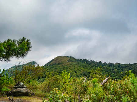 Khao Luang mountain With beautiful Blue Cloud sky in Ramkhamhaeng National Park,Sukhothai province Thailandの写真素材