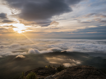 Beautiful Sunrise Sky with Sea of the mist of fog in the morning on Khao Luang mountain in Ramkhamhaeng National Park,Sukhothai province Thailandの写真素材