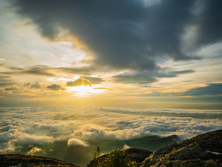 Beautiful Sunrise Sky with Sea of the mist of fog in the morning on Khao Luang mountain in Ramkhamhaeng National Park,Sukhothai province Thailandの写真素材