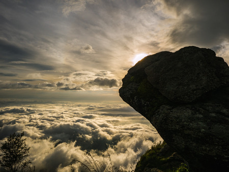 Beautiful Sunrise Sky with silhouette Rocky cliff in the morning on Khao Luang mountain in Ramkhamhaeng National Park,Sukhothai province Thailandの写真素材