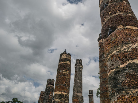Ruin of Wat mahathat Temple Area in sukhothai historical parkの写真素材