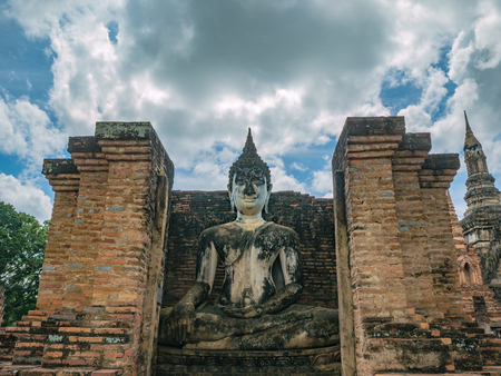 Buddha Statue in Wat mahathat Temple Area At sukhothai historical park,Sukhothai city Thailandの写真素材