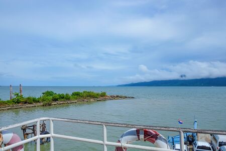 Ferry Cross the sea to Koh chang with Cloudy sky in vacation time.Koh chang Trat Thailandの写真素材