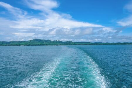 Ferry Cross the sea to Koh chang with Cloudy sky in vacation time.Koh chang Trat Thailandの写真素材