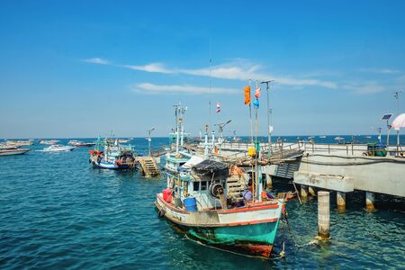 Beautiful view From Koh Lan island Pier with Fisherman Boat park near the pier.Thailand holiday conceptの写真素材