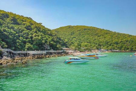 Tropical Idyllic Ocean and Boat on Koh lan Island in vacation time. Koh lan island is the Famous island near Pattaya city the Travel Destination in Thailand,Thailand holiday conceptの写真素材