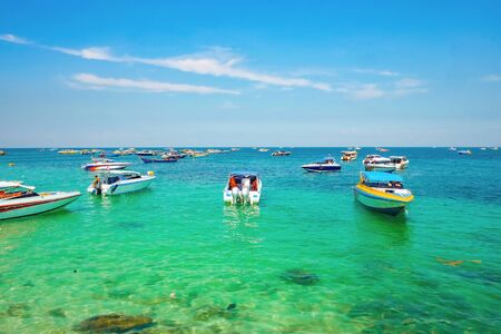 Tropical Idyllic Ocean and Boat on Koh lan Island in vacation time. Koh lan island is the Famous island near Pattaya city the Travel Destination in Thailand,Thailand holiday conceptの写真素材