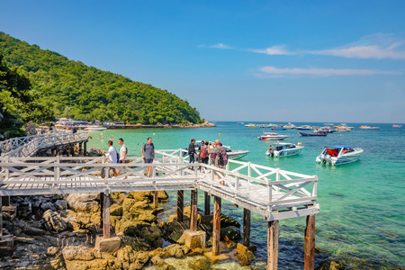 Bangkok, Thailand - 21 June 2017 : Unacquainted Tourists in Tropical Idyllic Ocean and Boat on Koh larn Island in vacation time. Koh larn island is the Famous island near Pattaya city the Travel Destination in Thailand, Thailand holiday conceptのeditorial素材