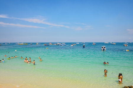 Bangkok, Thailand - 21 June 2017 : Unacquainted Tourists in Tropical Idyllic Ocean and Boat on Koh larn Island in vacation time. Koh larn island is the Famous island near Pattaya city the Travel Destination in Thailand, Thailand holiday conceptのeditorial素材