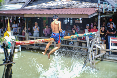 Bangkok, Thailand - 21 June 2017 : Unacquainted Thai Water boxing in Pattaya Floating Market. Chonburi Thailand Travel. Pattaya Floating Market is the Famous Floating Market near Pattayaのeditorial素材
